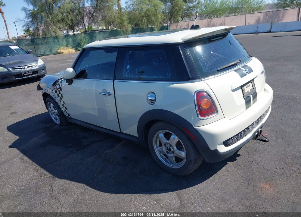 2009 MINI COOPER S VIN: WMWMF73599TW87858