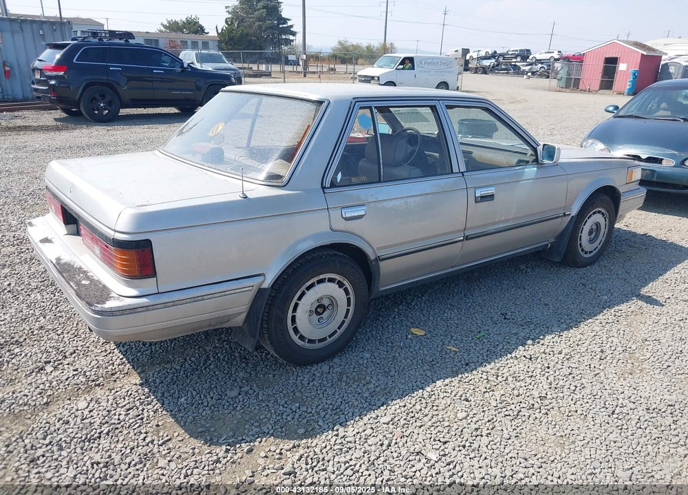 1987 NISSAN MAXIMA VIN: JN1HU11S5HT250179