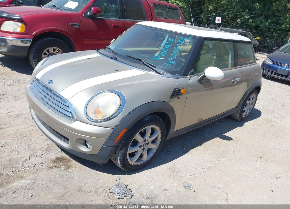 2007 MINI COOPER VIN: WMWMF335X7TT55434