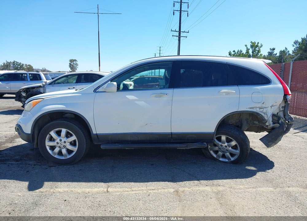 2009 HONDA CR-V VIN: JHLRE38749C004384