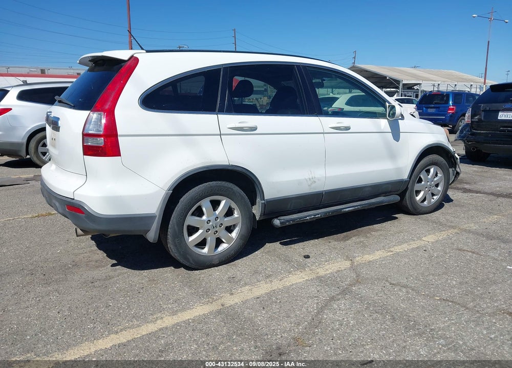 2009 HONDA CR-V VIN: JHLRE38749C004384