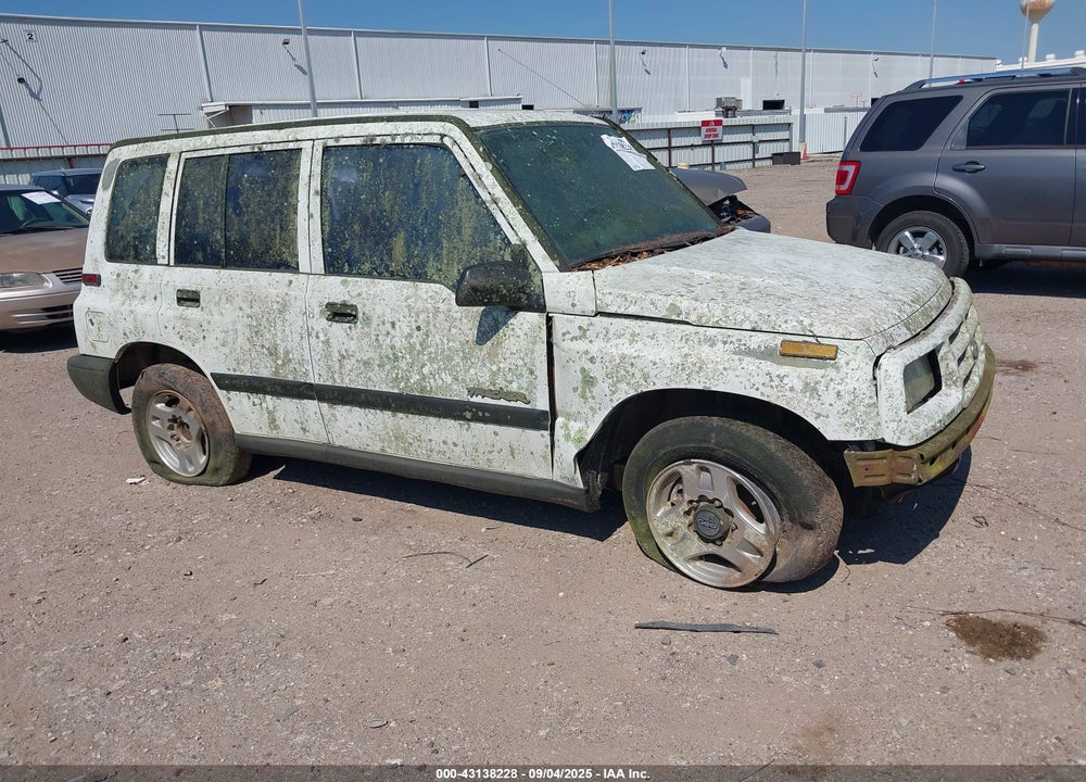 1996 GEO TRACKER VIN: 2CNBE1369T6943219