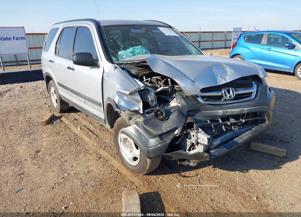 2002 HONDA CR-V LX VIN: JHLRD68462C023390