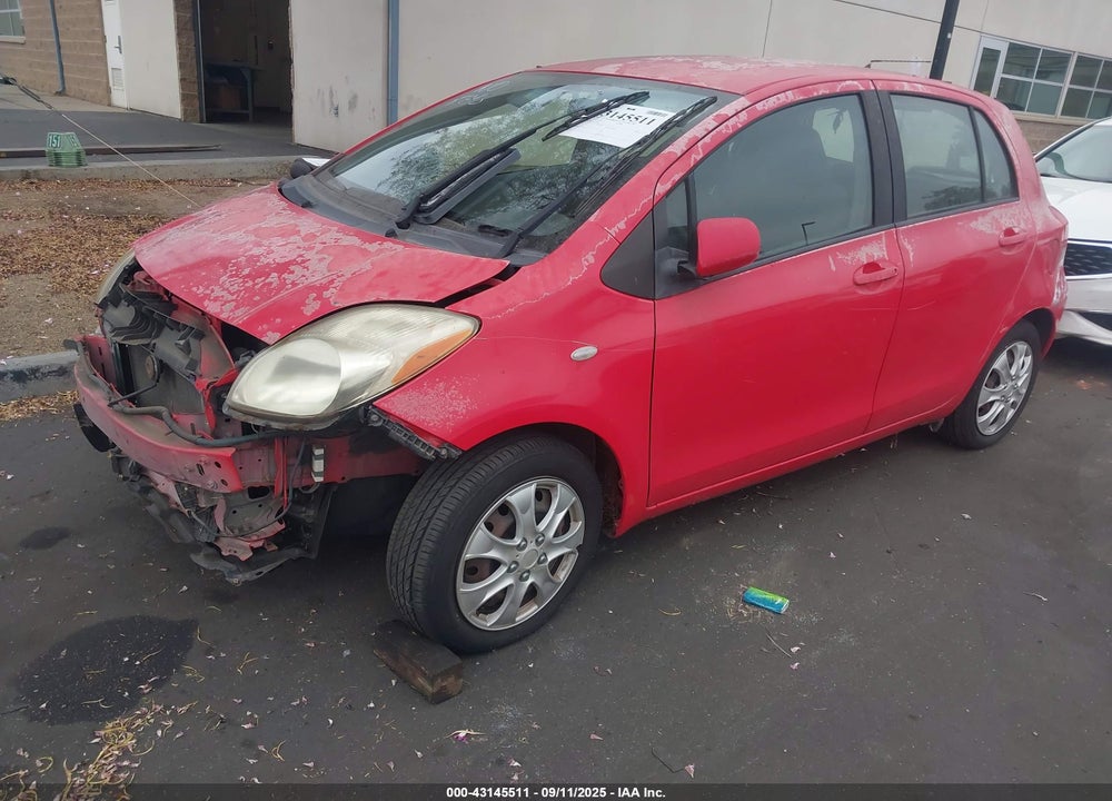 2009 TOYOTA YARIS VIN: JTDKT903095232662