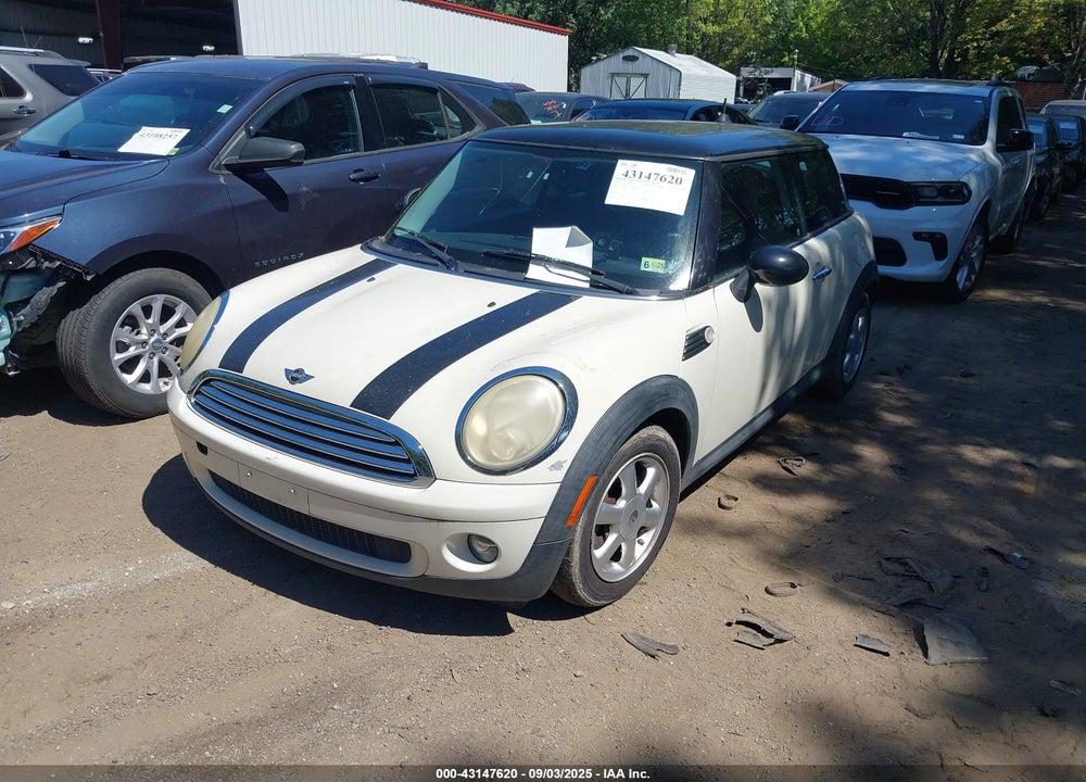 2009 MINI COOPER VIN: WMWMF33549TU70209