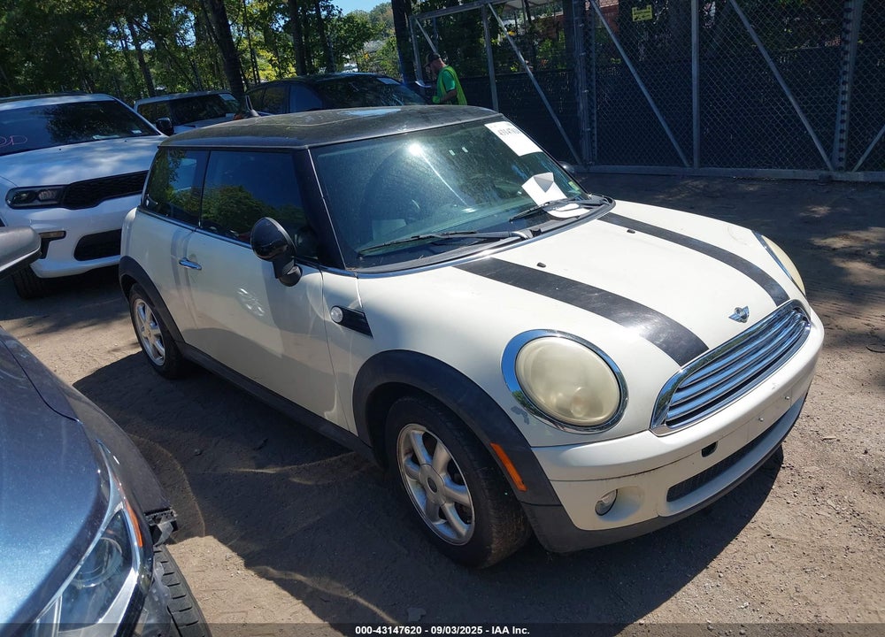 2009 MINI COOPER VIN: WMWMF33549TU70209