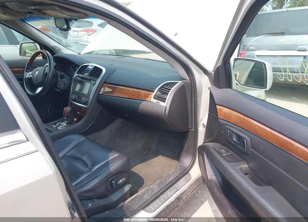 2009 CADILLAC SRX V6 VIN: 1GYEE437090107659
