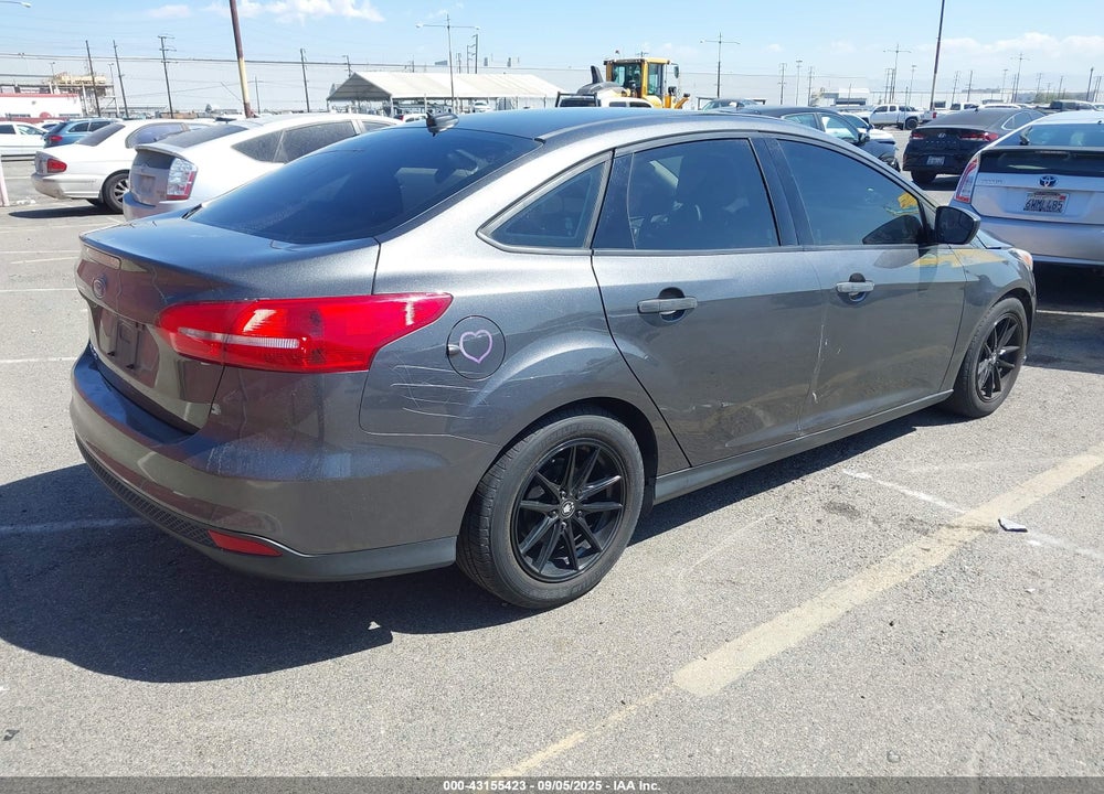 2016 FORD FOCUS VIN: 1FADP3E23GL238836