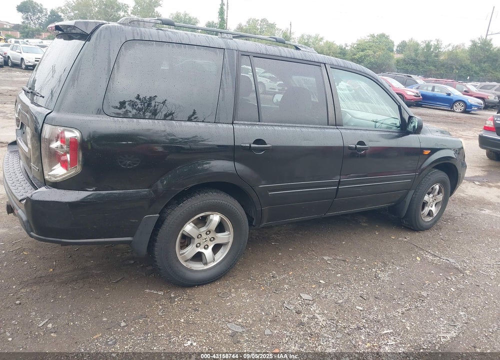 2006 HONDA PILOT EX-L VIN: 5FNYF18596B011435