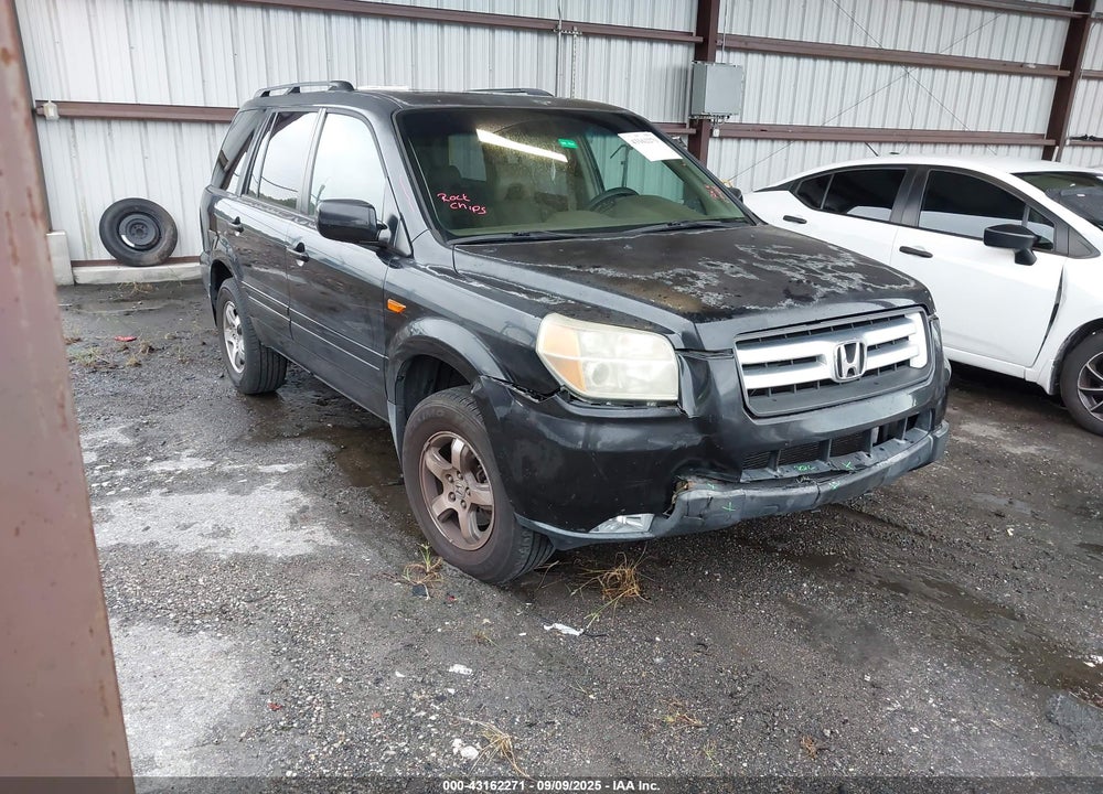 2006 HONDA PILOT EX-L VIN: 5FNYF28676B026112