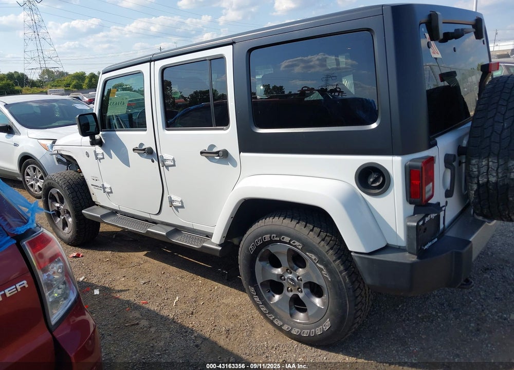 2016 JEEP WRANGLER UNLIMITED SAHARA VIN: 1C4BJWEG5GL311687