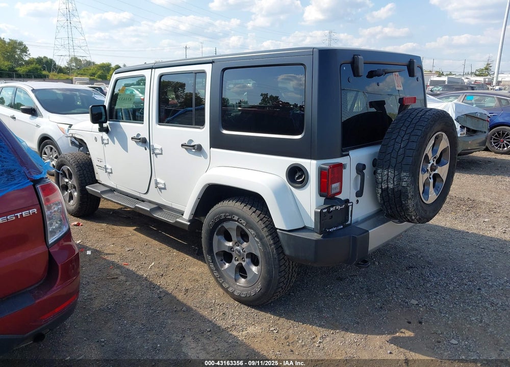2016 JEEP WRANGLER UNLIMITED SAHARA VIN: 1C4BJWEG5GL311687