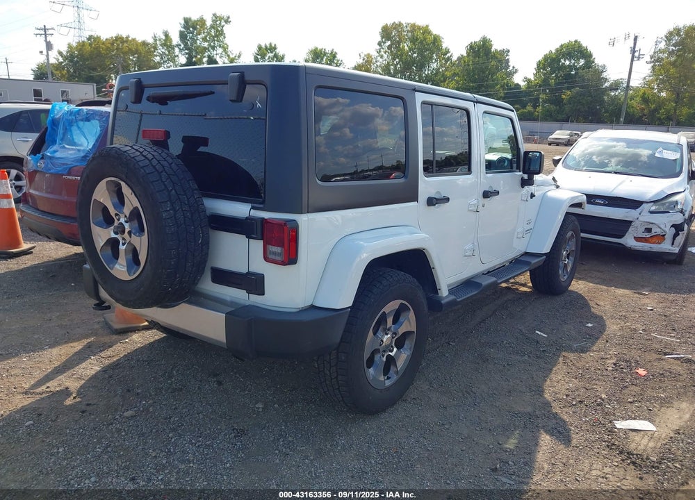 2016 JEEP WRANGLER UNLIMITED SAHARA VIN: 1C4BJWEG5GL311687