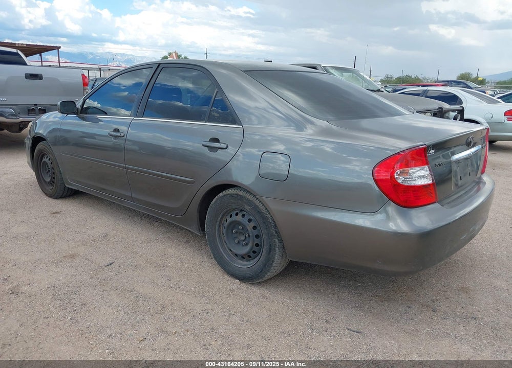 2002 TOYOTA CAMRY LE VIN: JTDBE30K520109683