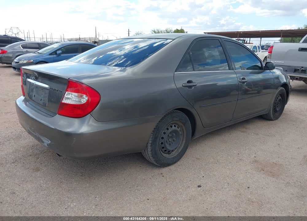 2002 TOYOTA CAMRY LE VIN: JTDBE30K520109683