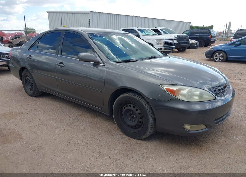 2002 TOYOTA CAMRY LE VIN: JTDBE30K520109683