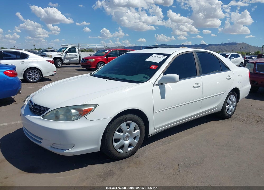 2004 TOYOTA CAMRY LE VIN: JTDBE32K240272050
