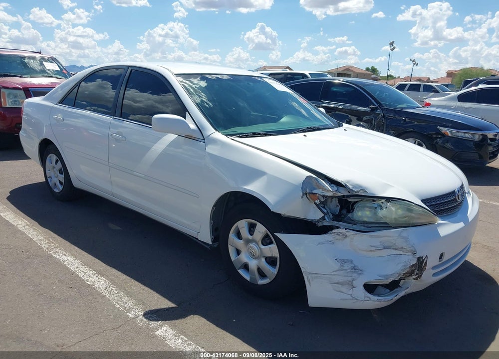 2004 TOYOTA CAMRY LE VIN: JTDBE32K240272050