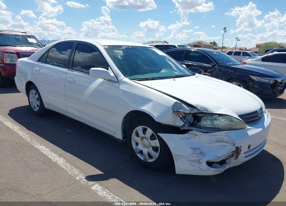 2004 TOYOTA CAMRY LE VIN: JTDBE32K240272050