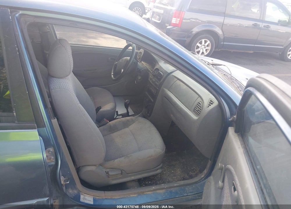 2002 KIA RIO VIN: KNADC123926157156