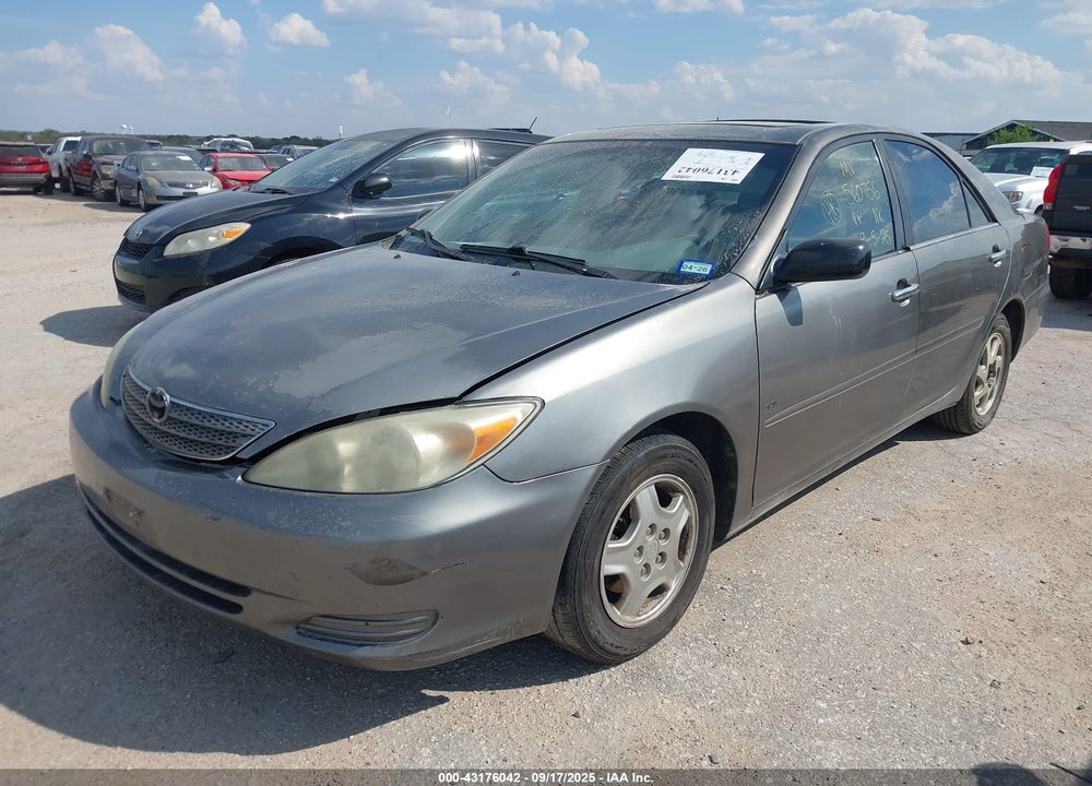 2003 TOYOTA CAMRY LE VIN: 4T1BF30KX3U560756