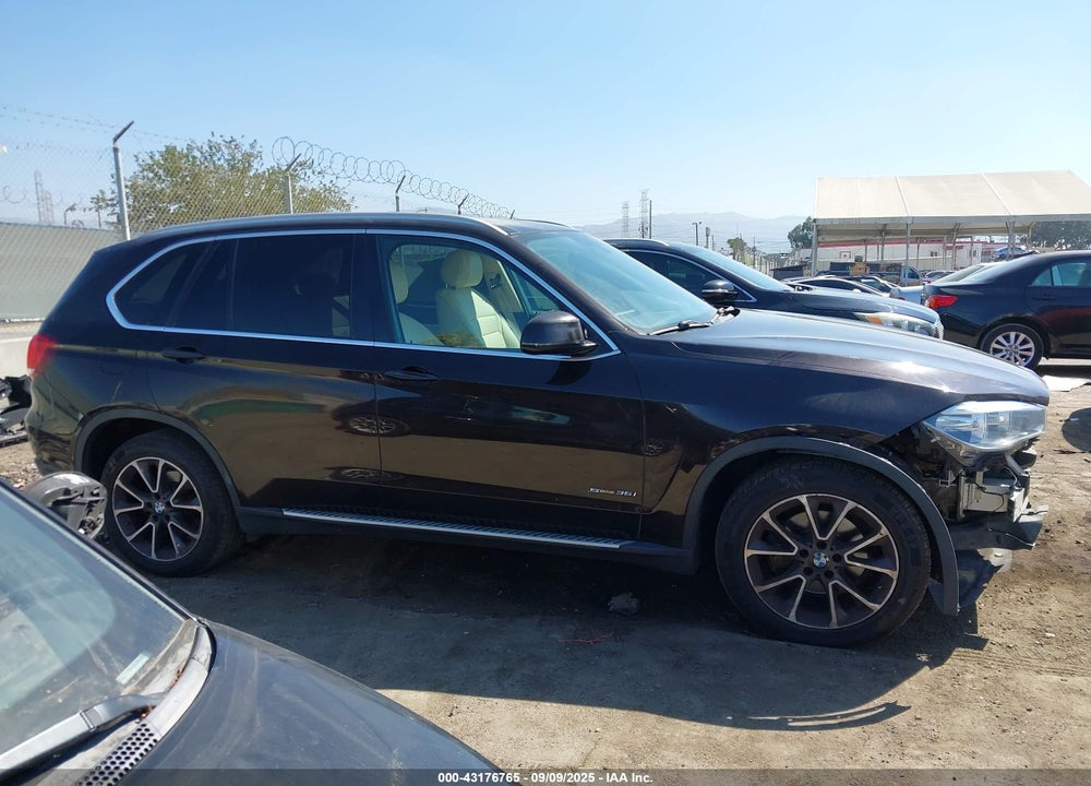 2014 BMW X5 VIN: 5UXKR2C5XE0C00586