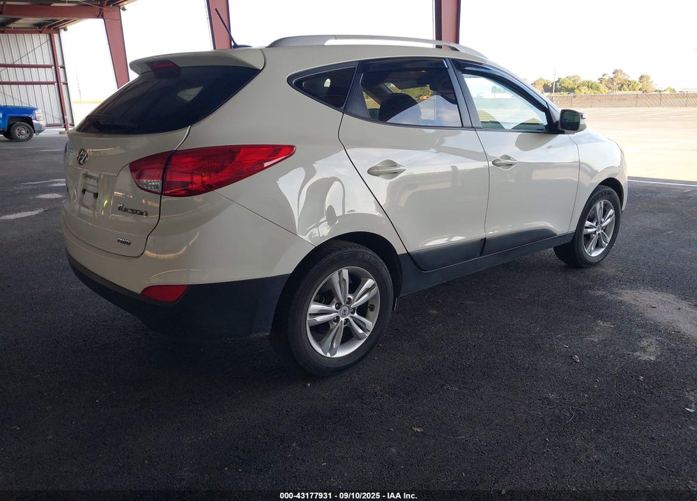 2012 HYUNDAI TUCSON VIN: KM8JUCAC5CU510047