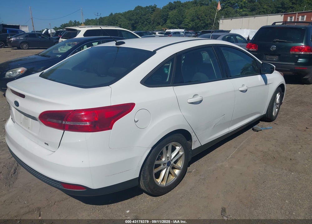 2016 FORD FOCUS VIN: 1FADP3F21GL247873