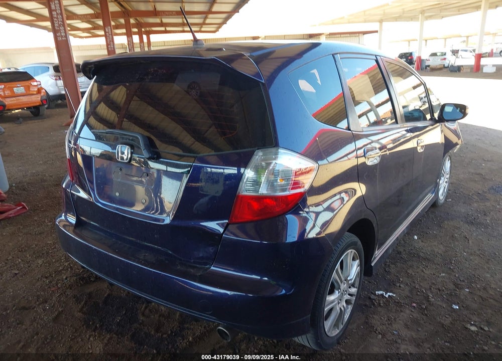 2010 HONDA FIT VIN: JHMGE8H4XAC028229