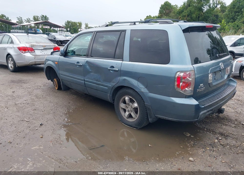 2006 HONDA PILOT EX-L VIN: 2HKYF18626H547329