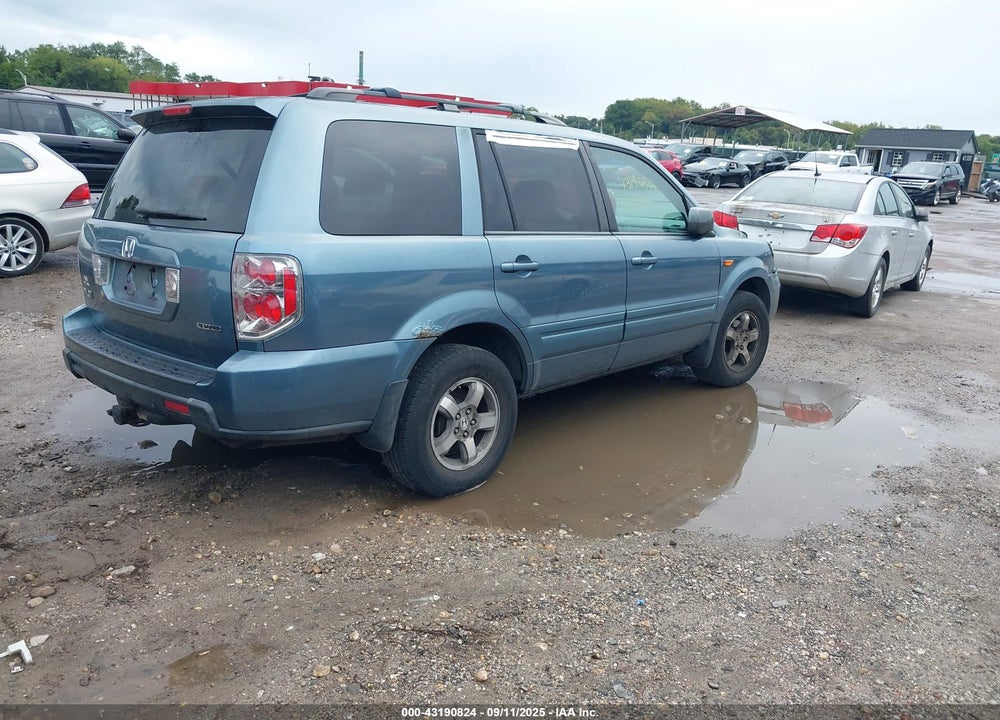 2006 HONDA PILOT EX-L VIN: 2HKYF18626H547329
