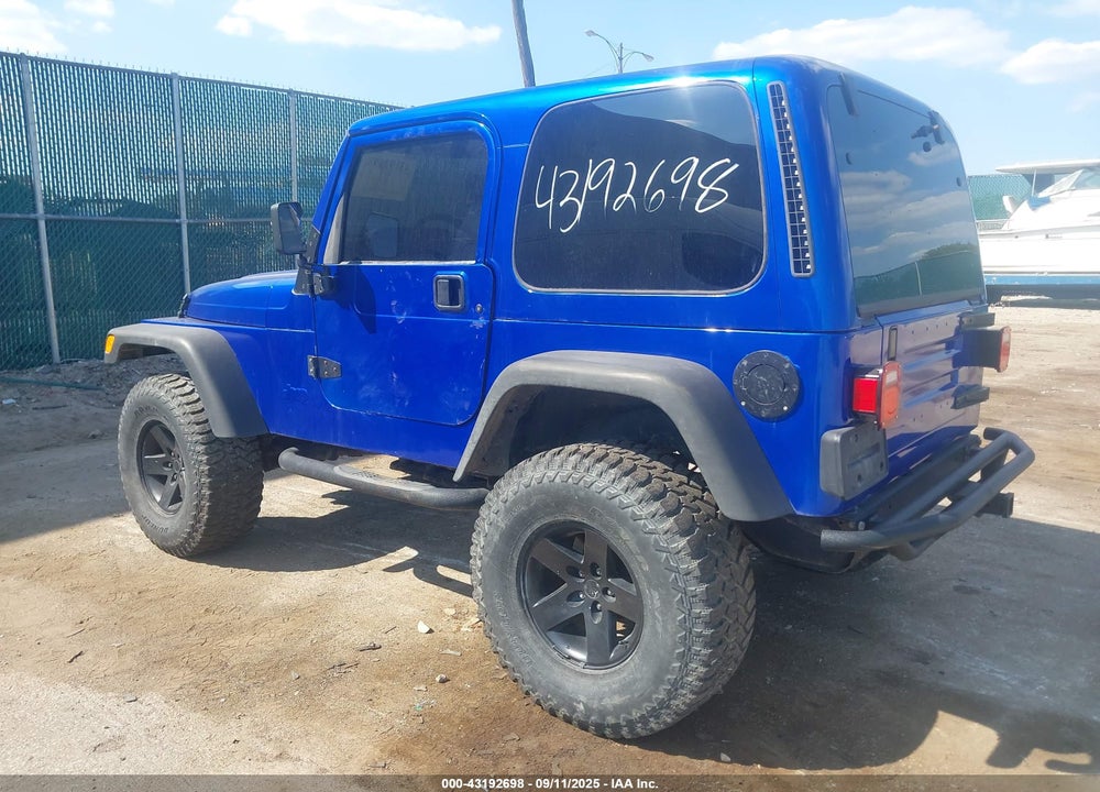 2000 JEEP WRANGLER SPORT VIN: 1J4FA49S0YP735660
