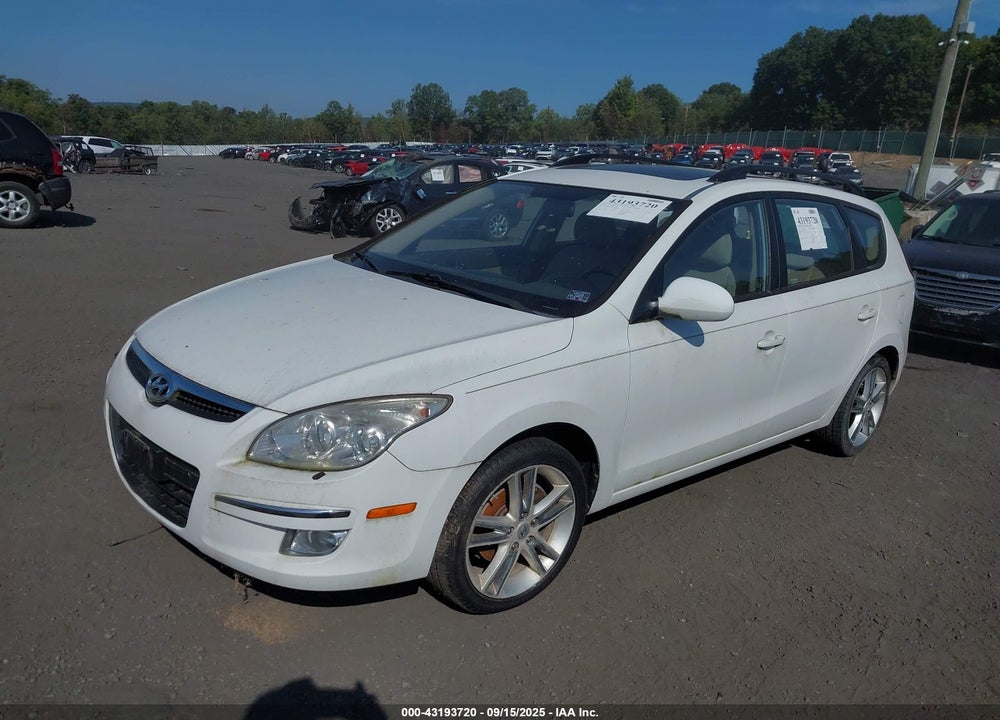 2010 HYUNDAI ELANTRA TOURING SE VIN: KMHDC8AE2AU066198
