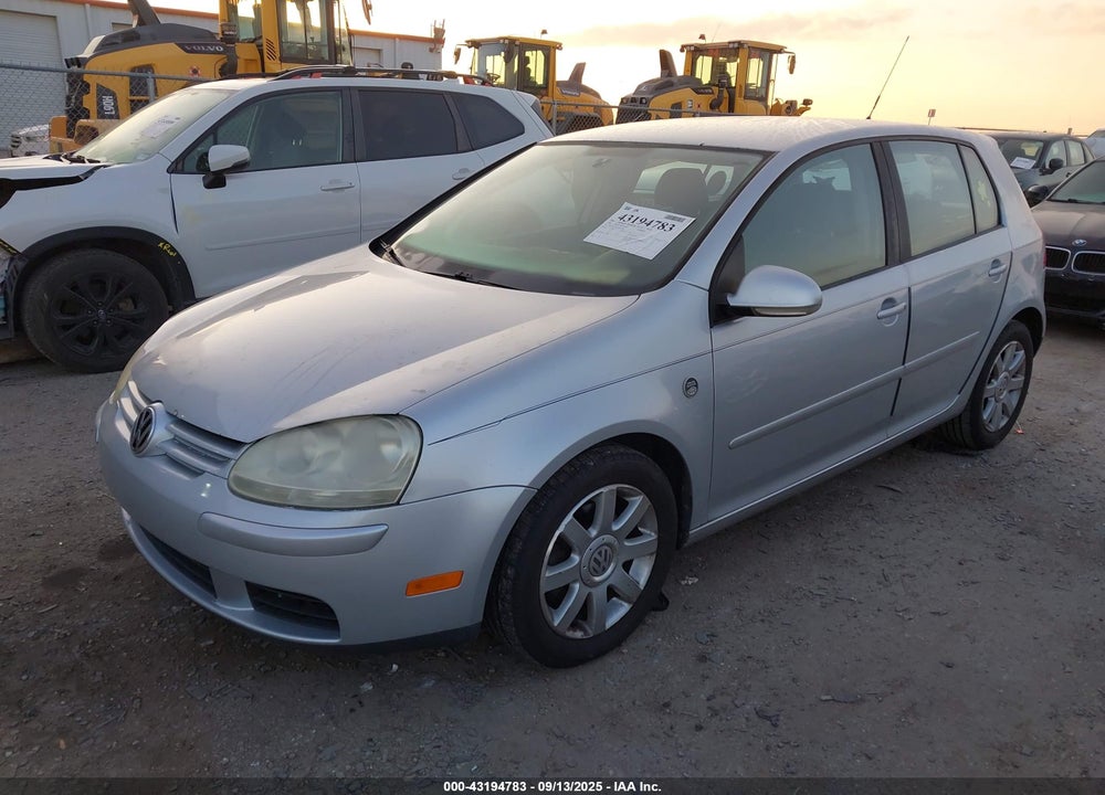 2009 VOLKSWAGEN RABBIT VIN: WVWDA71K59W077092