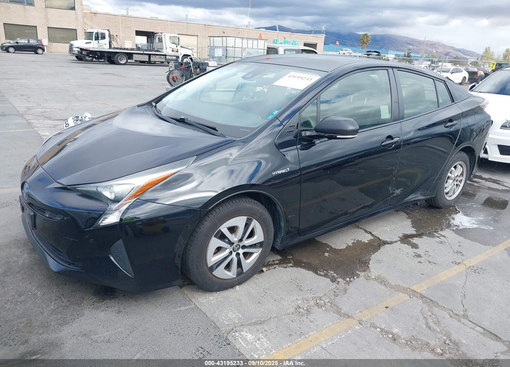 2018 TOYOTA PRIUS TWO VIN: JTDKBRFU9J3063552