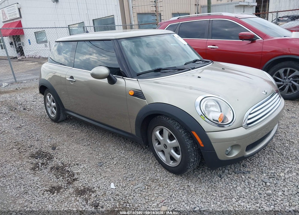 2009 MINI COOPER VIN: WMWMF33529TW77634