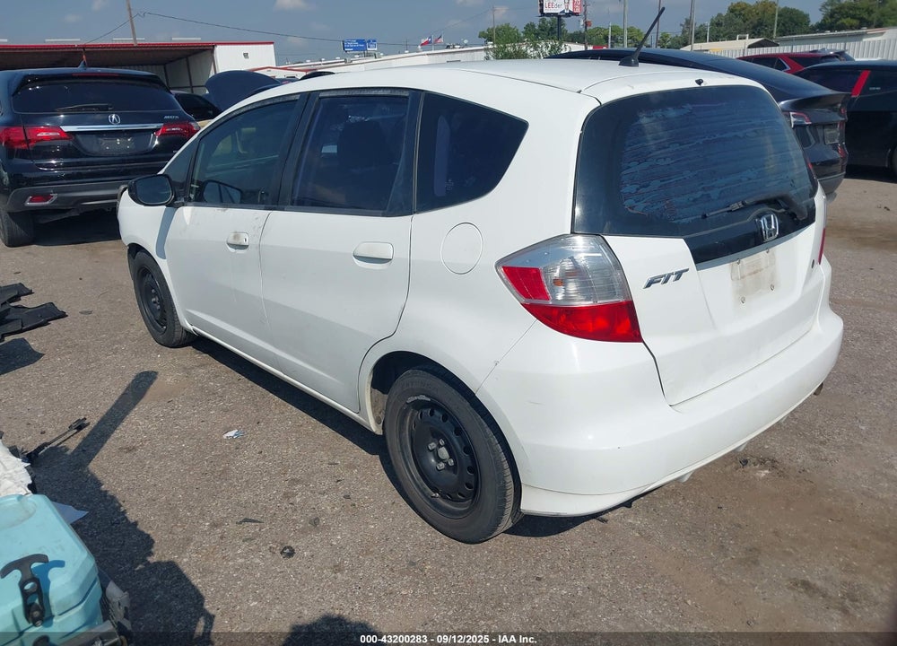 2009 HONDA FIT VIN: JHMGE88269S032469