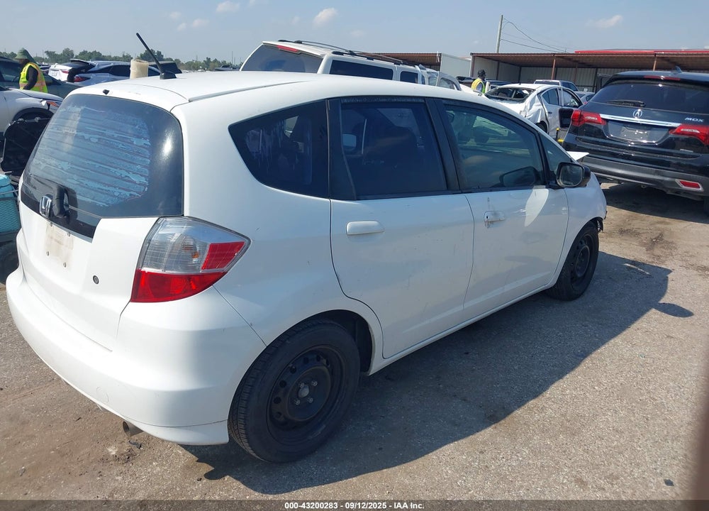 2009 HONDA FIT VIN: JHMGE88269S032469
