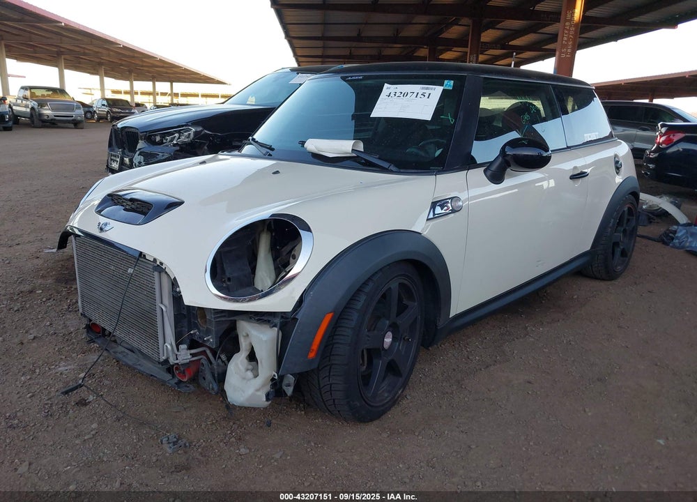2010 MINI COOPER VIN: WMWMF7C5XATZ72332