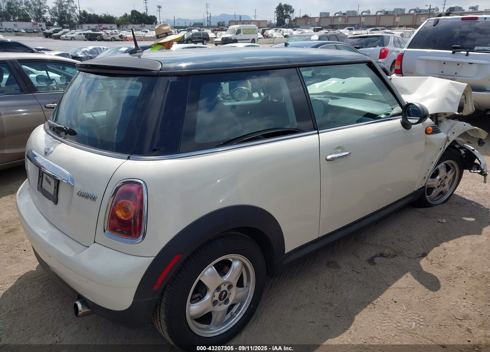 2010 MINI COOPER VIN: WMWMF3C58ATU77216