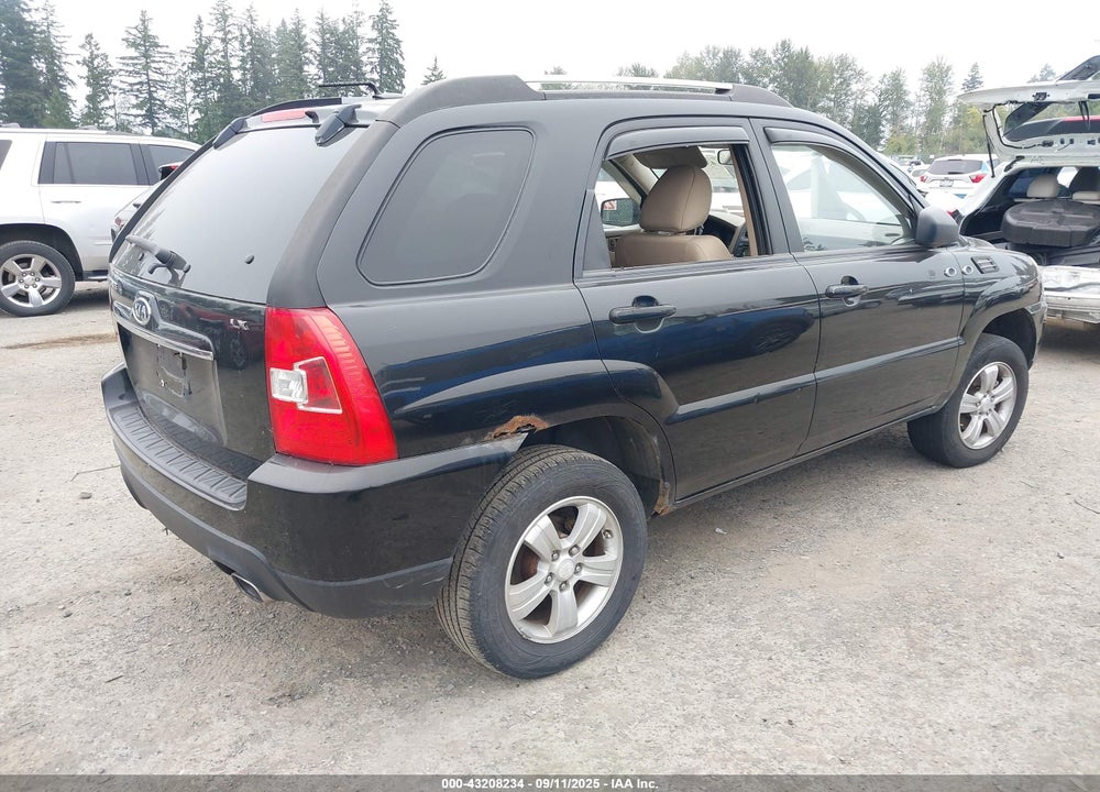 2009 KIA SPORTAGE VIN: KNDJF724897659492