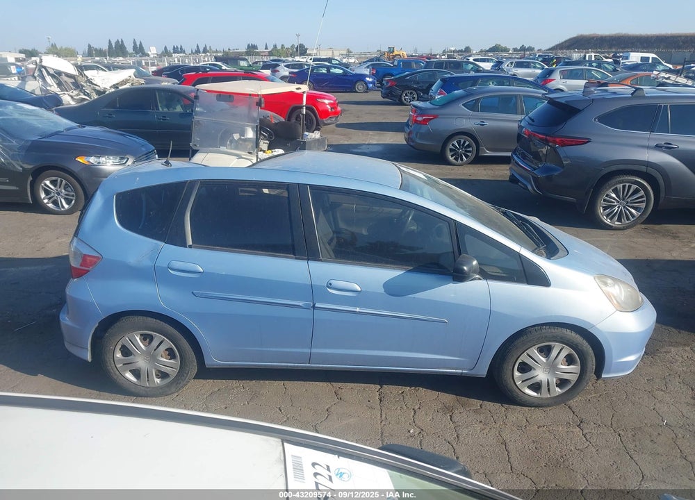 2009 HONDA FIT VIN: JHMGE87279S005332