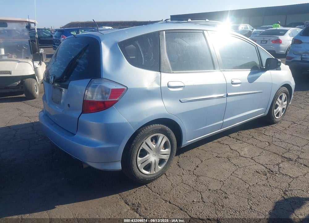 2009 HONDA FIT VIN: JHMGE87279S005332