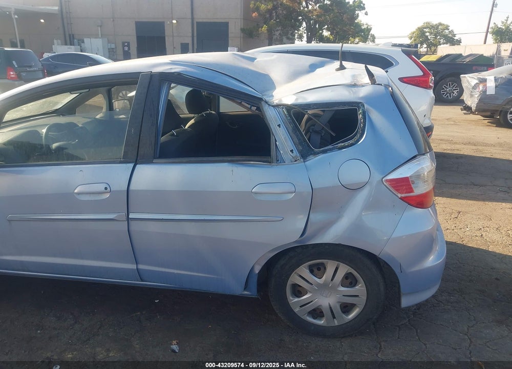 2009 HONDA FIT VIN: JHMGE87279S005332