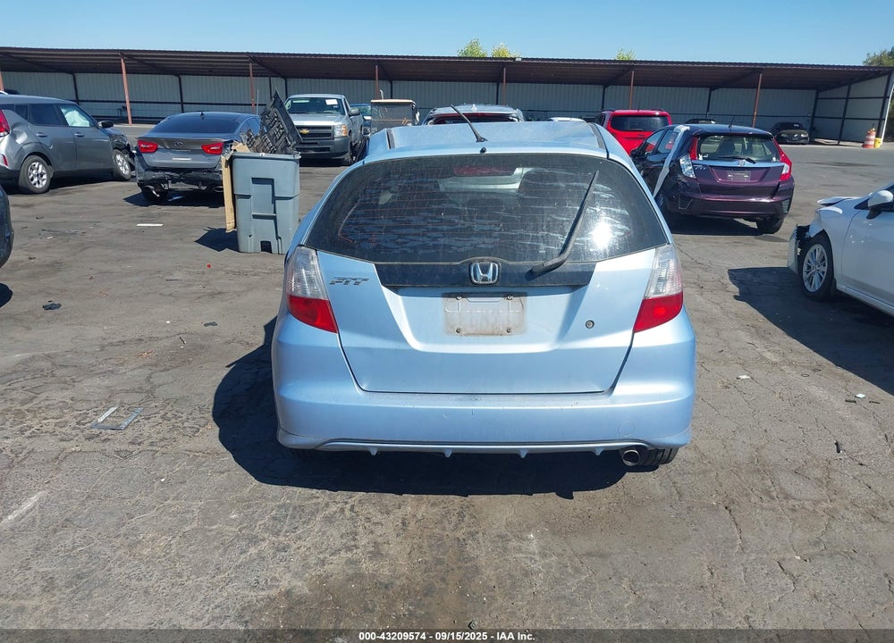 2009 HONDA FIT VIN: JHMGE87279S005332