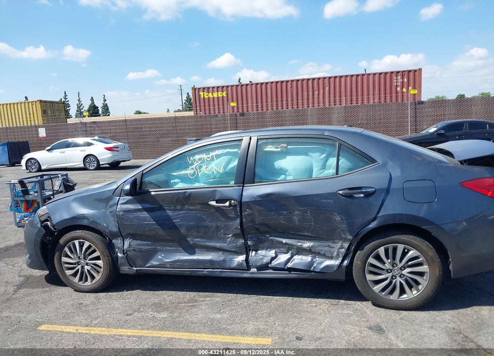 2018 TOYOTA COROLLA XLE VIN: 5YFBURHE7JP743862