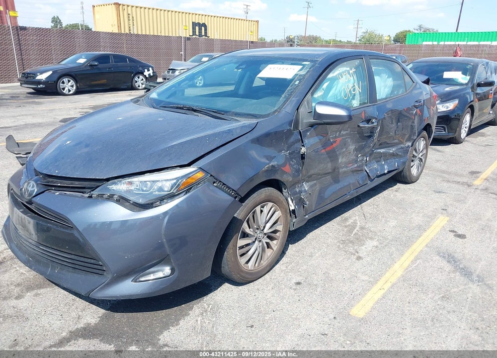 2018 TOYOTA COROLLA XLE VIN: 5YFBURHE7JP743862