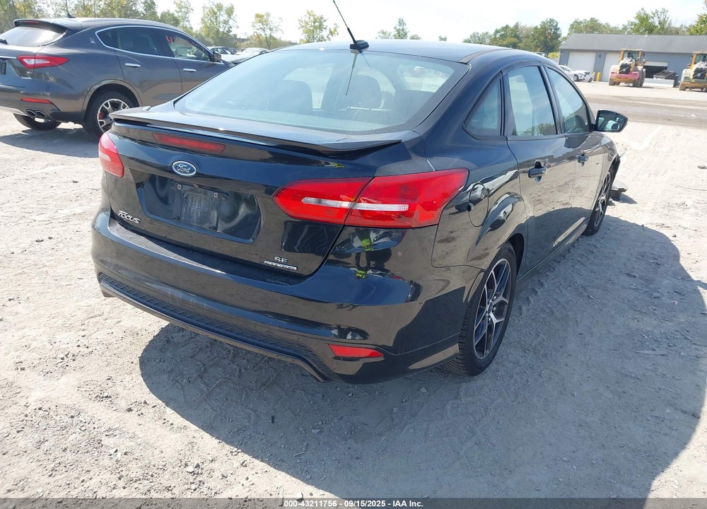 2015 FORD FOCUS VIN: 1FADP3F24FL230161