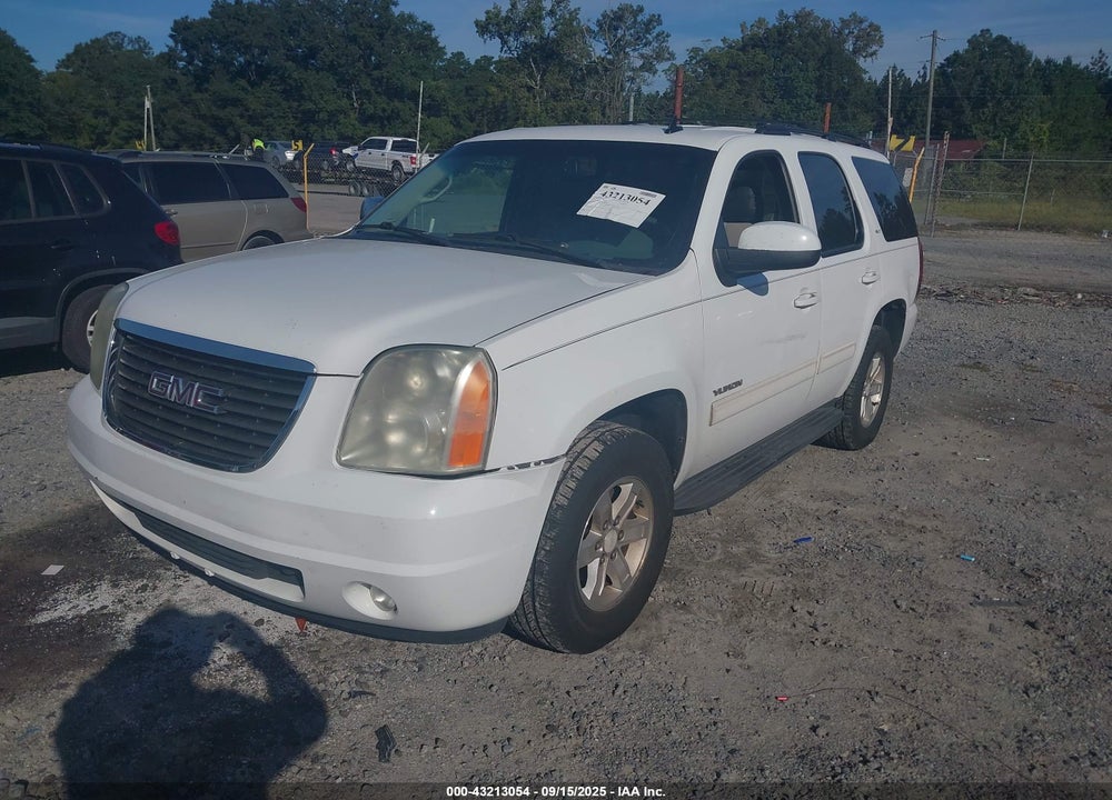 2011 GMC YUKON VIN: 1GKS1CE00BR402474