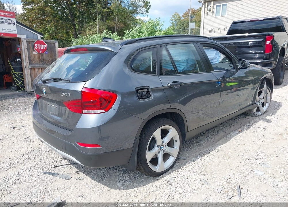 2014 BMW X1 VIN: WBAVL1C57EVY22330